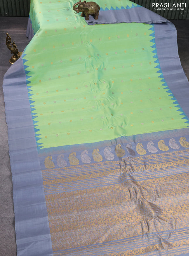 Pure gadwal silk saree green shade and grey with silver & gold zari woven floral buttas and temple design silver zari woven border