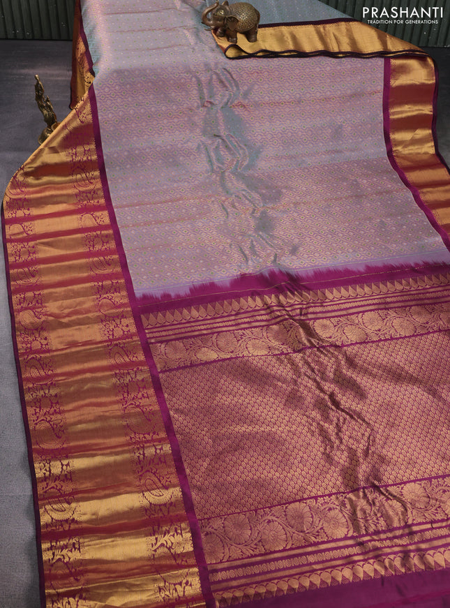 Pure gadwal silk saree dual shade of grey and dark magenta pink with allover zari woven brocade weaves and long rich zari woven border