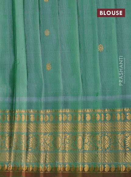 Pure gadwal silk saree purple and green shade with zari woven buttas and temple design zari woven border