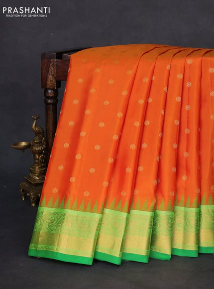 Pure gadwal silk saree sunset orange and light green with zari woven buttas and temple design zari woven border