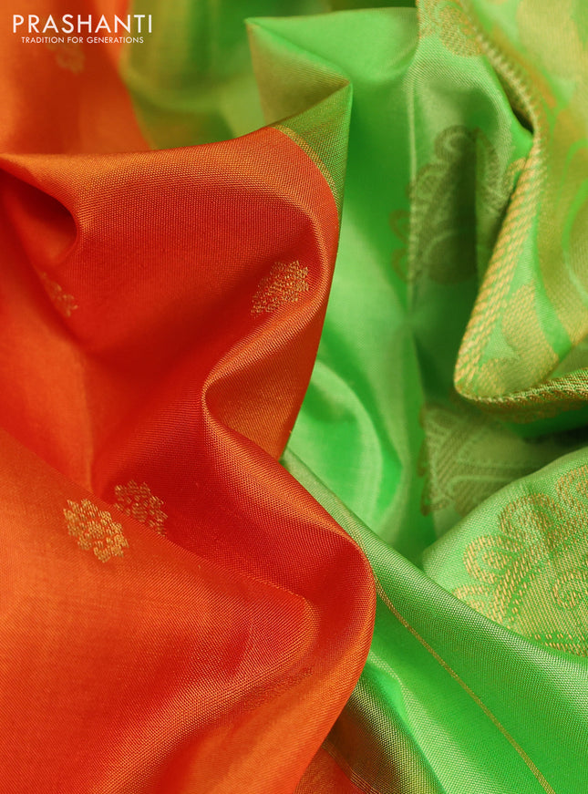 Pure gadwal silk saree sunset orange and light green with zari woven buttas and temple design zari woven border