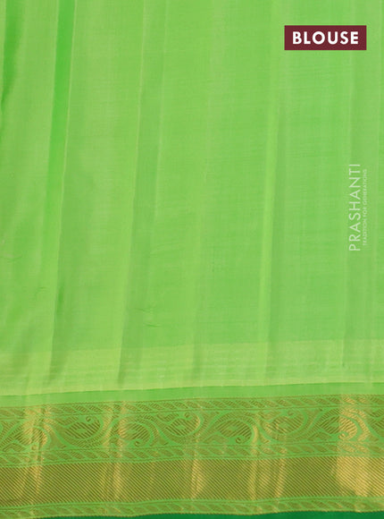 Pure gadwal silk saree sunset orange and light green with zari woven buttas and temple design zari woven border