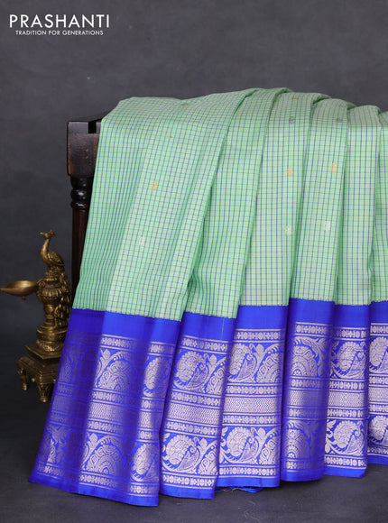 Pure gadwal silk saree pastel green and blue with allover checked pattern & zari buttas and long silver zari woven border