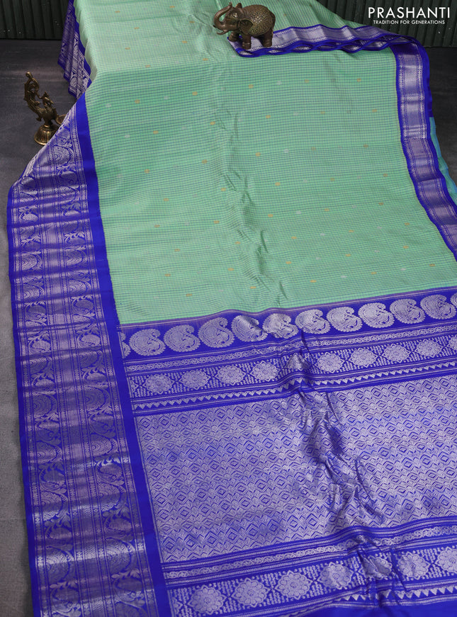 Pure gadwal silk saree pastel green and blue with allover checked pattern & zari buttas and long silver zari woven border