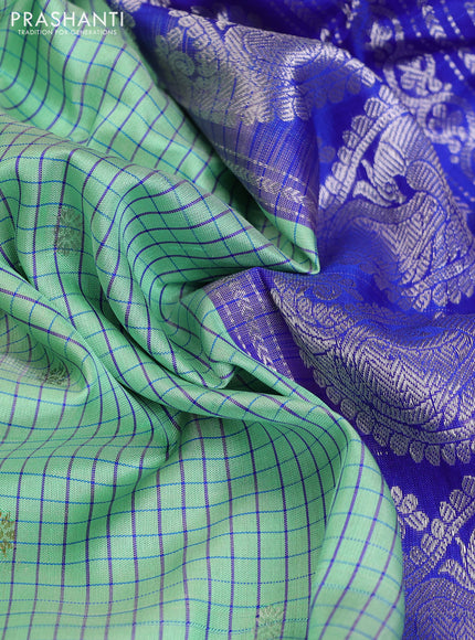 Pure gadwal silk saree pastel green and blue with allover checked pattern & zari buttas and long silver zari woven border