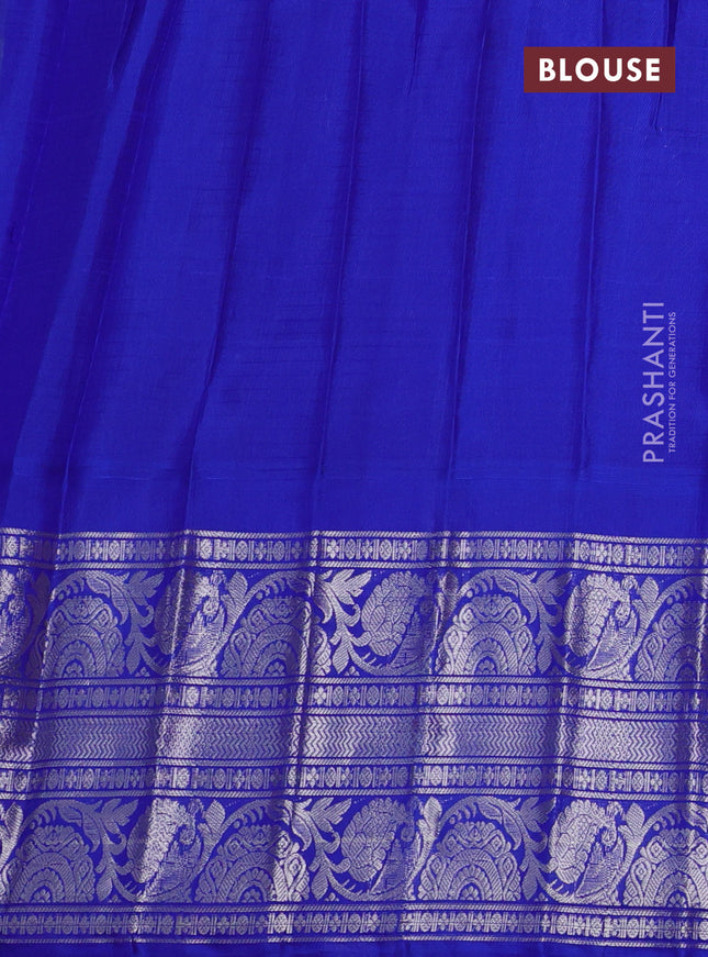 Pure gadwal silk saree pastel green and blue with allover checked pattern & zari buttas and long silver zari woven border