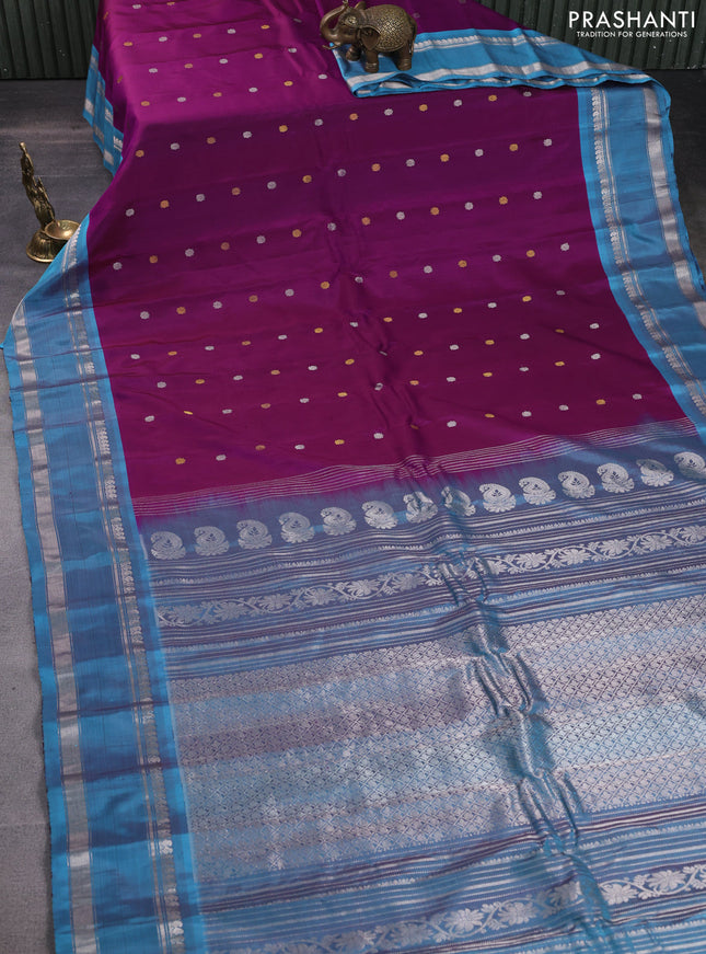 Pure gadwal silk saree purple and pastel blue with silver & gold zari woven floral buttas and rettapet silver zari woven border
