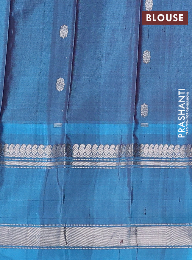 Pure gadwal silk saree purple and pastel blue with silver & gold zari woven floral buttas and rettapet silver zari woven border