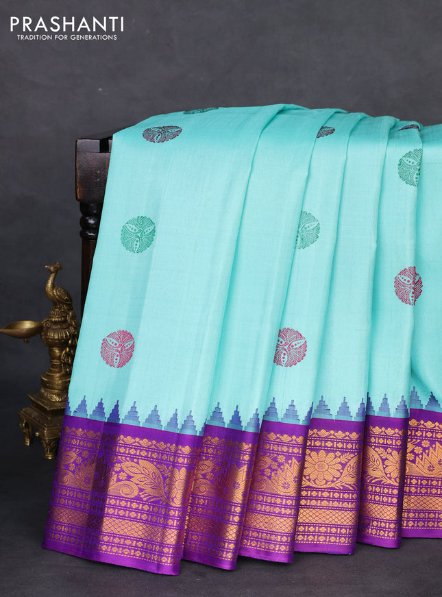 Pure gadwal silk saree teal blue and violet with thread woven buttas and temple design zari woven border