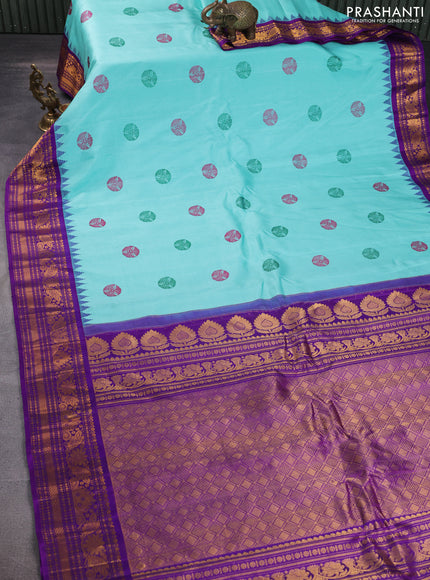 Pure gadwal silk saree teal blue and violet with thread woven buttas and temple design zari woven border