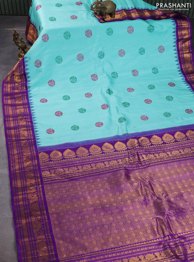 Pure gadwal silk saree teal blue and violet with thread woven buttas and temple design zari woven border