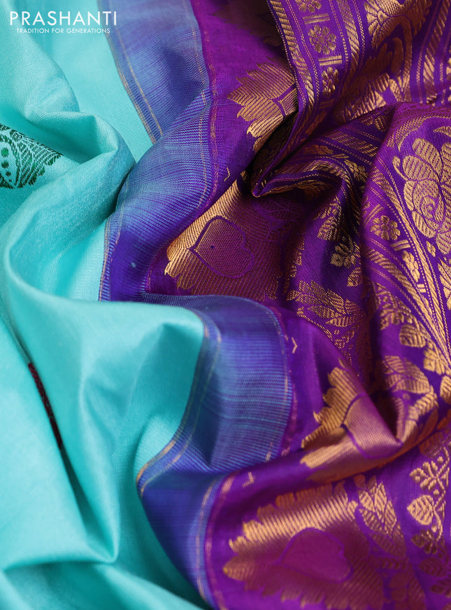 Pure gadwal silk saree teal blue and violet with thread woven buttas and temple design zari woven border