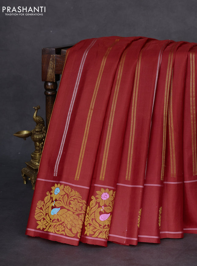 Pure gadwal silk saree red with allover silver & gold zari weaves and peacock design zari woven butta border