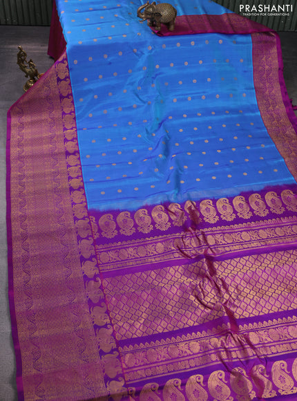 Pure gadwal silk saree blue and purple with zari woven buttas and long rich zari woven border