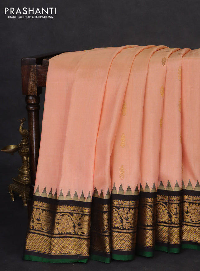 Pure gadwal silk saree peach orange and black with zari woven buttas and temple design zari woven border