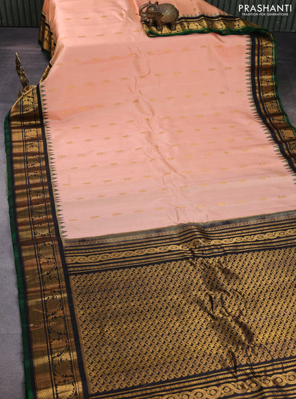 Pure gadwal silk saree peach orange and black with zari woven buttas and temple design zari woven border