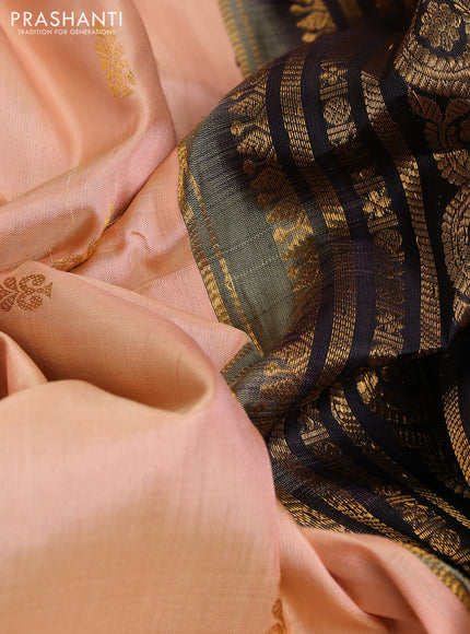 Pure gadwal silk saree peach orange and black with zari woven buttas and temple design zari woven border
