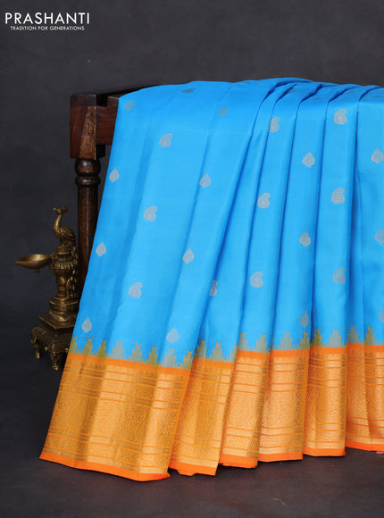 Pure gadwal silk saree light blue and orange with zari woven buttas and temple design zari woven border