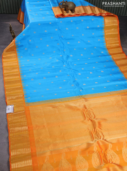 Pure gadwal silk saree light blue and orange with zari woven buttas and temple design zari woven border