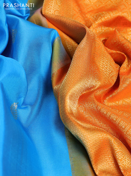 Pure gadwal silk saree light blue and orange with zari woven buttas and temple design zari woven border