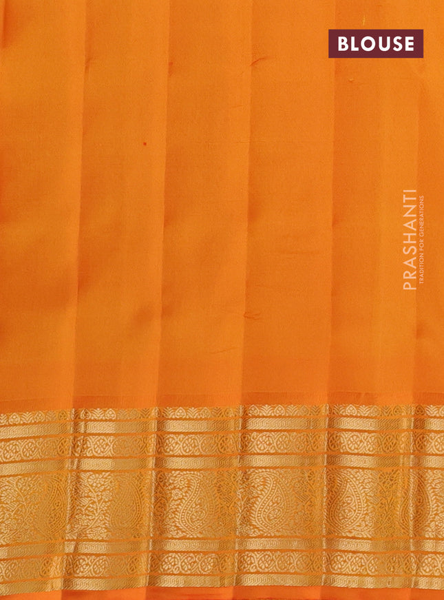 Pure gadwal silk saree light blue and orange with zari woven buttas and temple design zari woven border