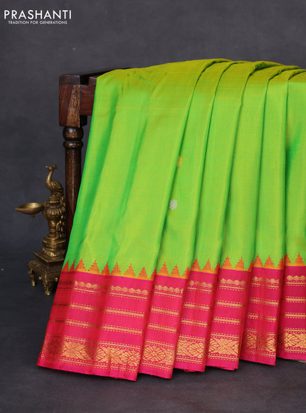 Pure gadwal silk saree parrot green and dual shade of pink with silver & gold zari woven buttas and zari woven border