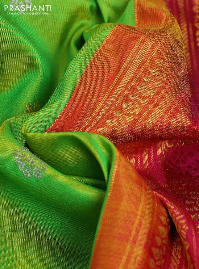 Pure gadwal silk saree parrot green and dual shade of pink with silver & gold zari woven buttas and zari woven border