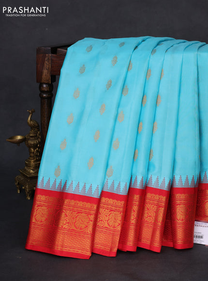Pure gadwal silk saree light blue and red with zari woven buttas and temple design zari woven border