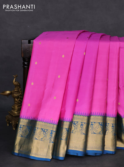 Pure gadwal silk saree pink and peacock blue with zari woven buttas and temple design zari woven border