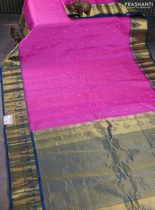 Pure gadwal silk saree pink and peacock blue with zari woven buttas and temple design zari woven border