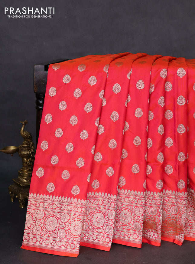 Banarasi uppada silk saree dual shade of pinkish orange with allover zari woven butta weaves and zari woven border