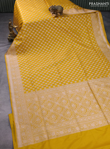 Banarasi uppada silk saree mustard yellow with allover zari woven buttas and zari woven border