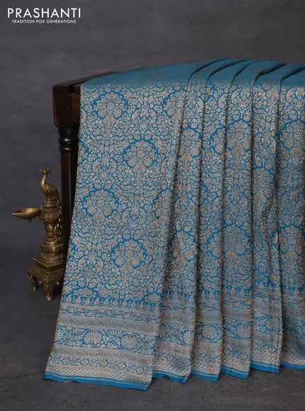 Banarasi crepe saree cs blue with allover thread & zari woven brocade weaves and woven border