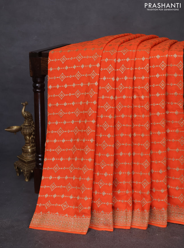 Banarasi crepe saree orange with allover thread & zari geometric weaves and woven border
