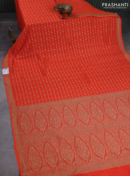 Banarasi crepe saree orange with allover thread & zari geometric weaves and woven border