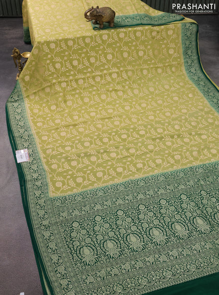 Banarasi crepe saree pista green and green with allover thread & zari weaves and woven border