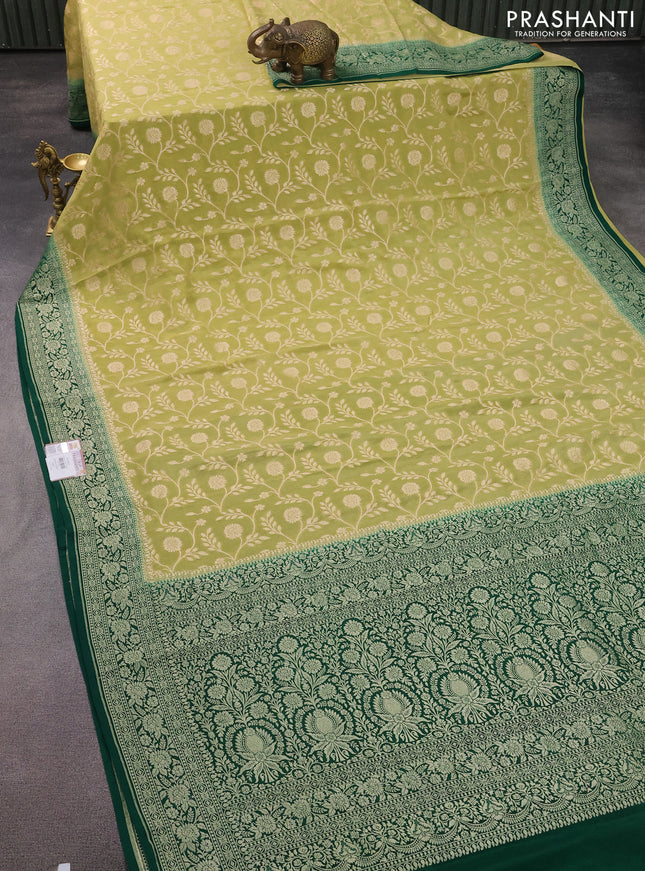 Banarasi crepe saree pista green and green with allover thread & zari weaves and woven border