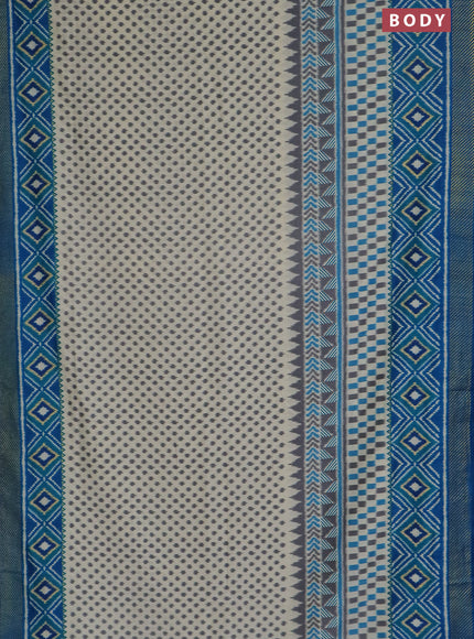 Semi patola saree off white and cs blue with allover ikat weaves and zari woven border