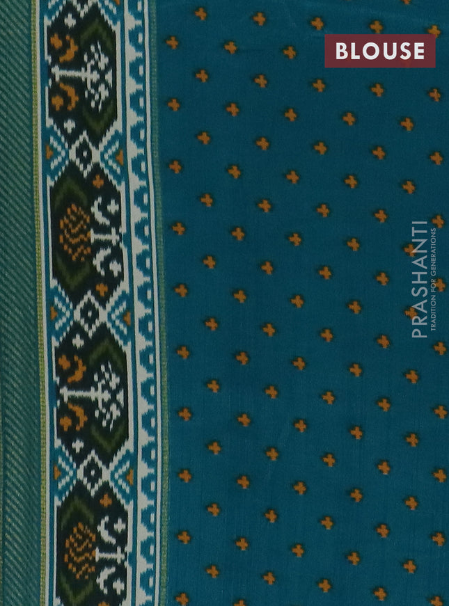 Semi patola saree off white and teal blue with allover ikat weaves and zari woven border