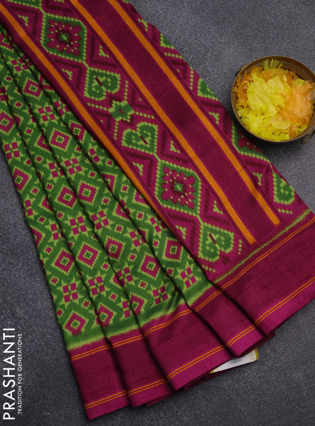 Semi patola saree green and dark magenta pink with allover ikat weaves and simple border