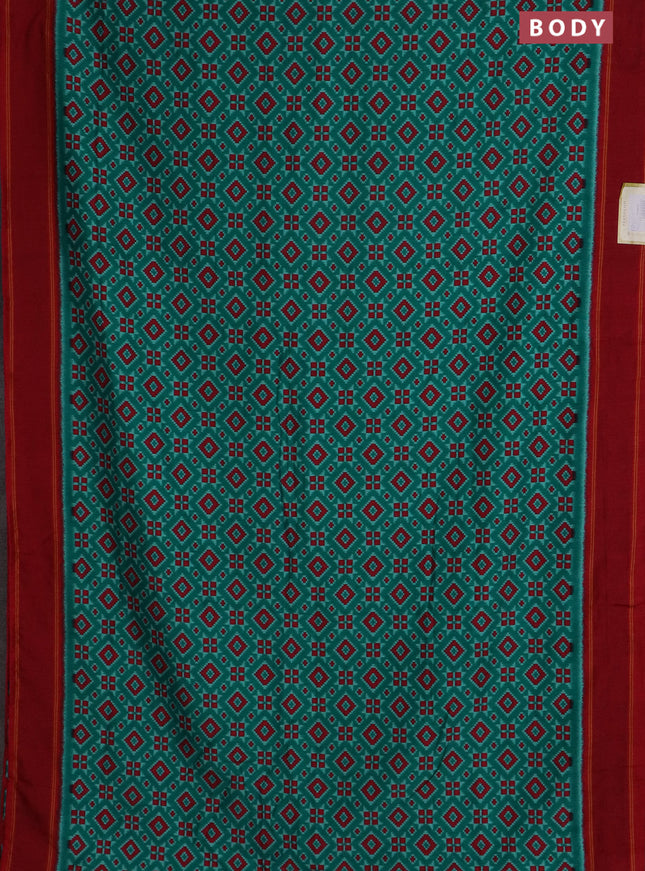 Semi patola saree teal green and red with allover ikat weaves and simple border