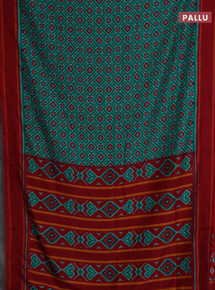 Semi patola saree teal green and red with allover ikat weaves and simple border