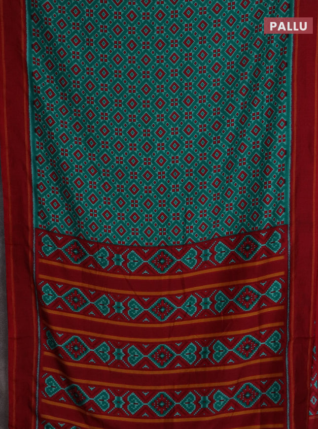 Semi patola saree teal green and red with allover ikat weaves and simple border