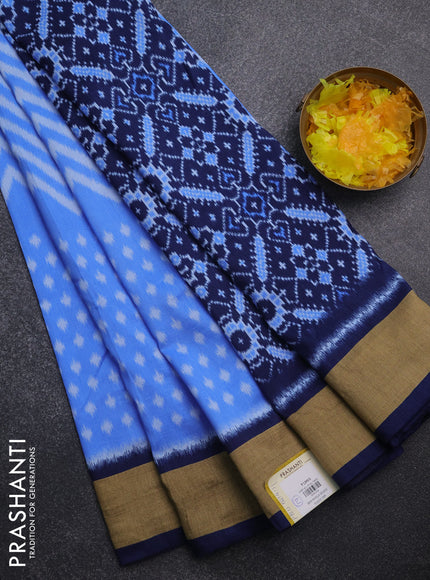 Semi patola saree light blue and navy blue with allover ikat weaves and woven border