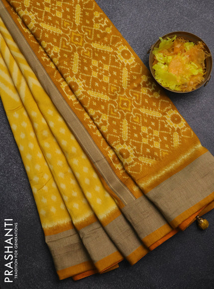 Semi patola saree yellow with allover ikat weaves and woven border