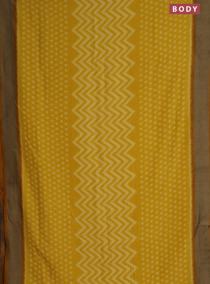 Semi patola saree yellow with allover ikat weaves and woven border