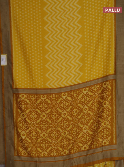 Semi patola saree yellow with allover ikat weaves and woven border