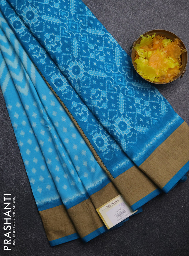 Semi patola saree light blue and cs blue with allover ikat weaves and woven border