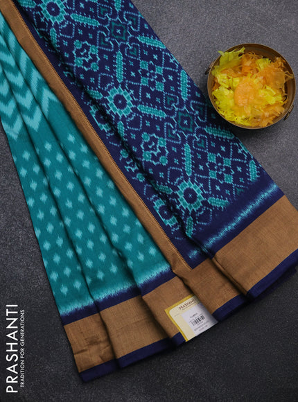 Semi patola saree teal green and navy blue with allover ikat weaves and woven border