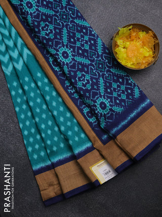 Semi patola saree teal green and navy blue with allover ikat weaves and woven border